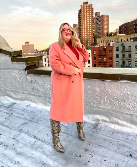 Sarah wears a wool Baacal car coat on a NYC rooftop