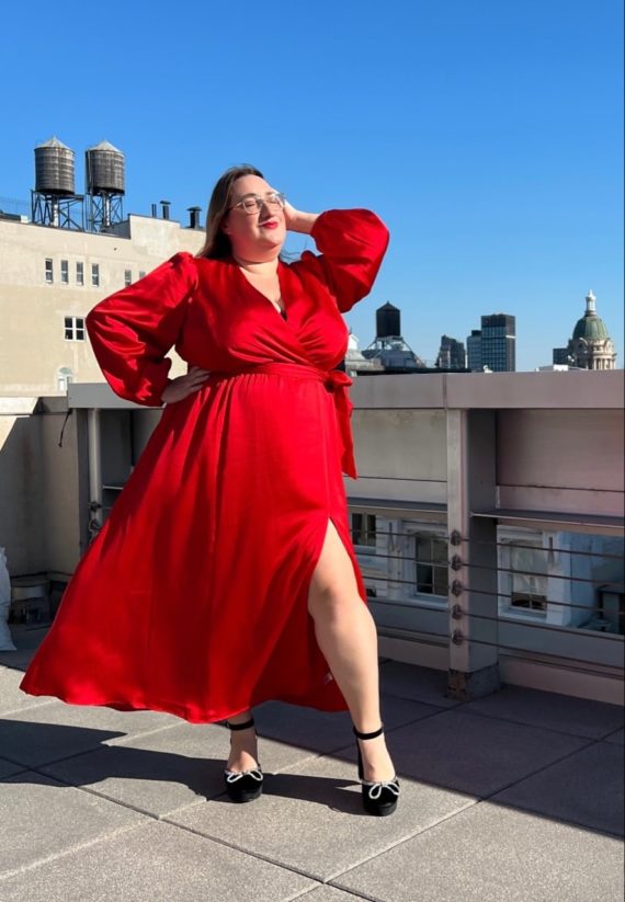Photo of Sarah Chiwaya in red satin maxi dress