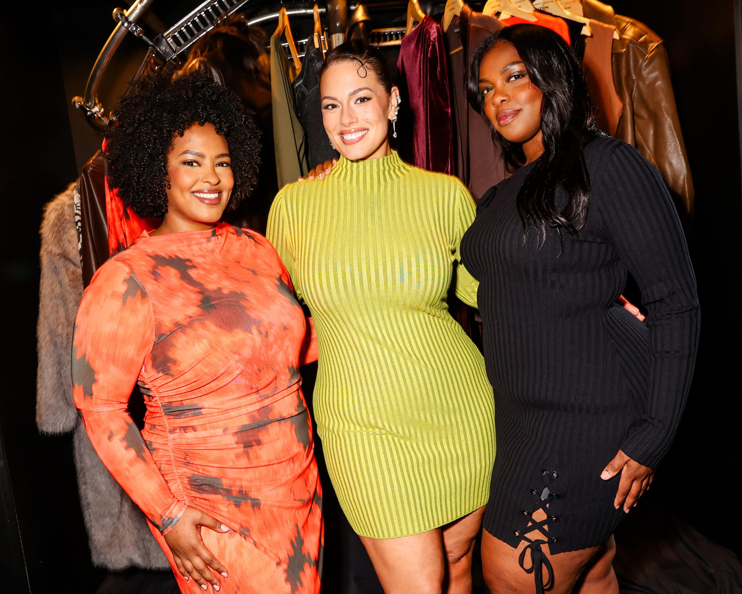 Ashley Graham and two models wearing clothing from her new JCPenney exclusive plus size collection