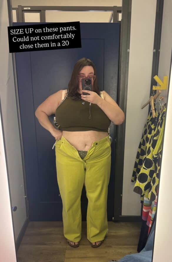 Sarah tries on the olive tank top and lime wide leg jeans from the Christopher John Rogers x Old Navy collab